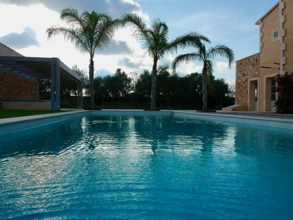 Garden in the Santanyí area of Mallorca with pool, palms and Mediterranean planting