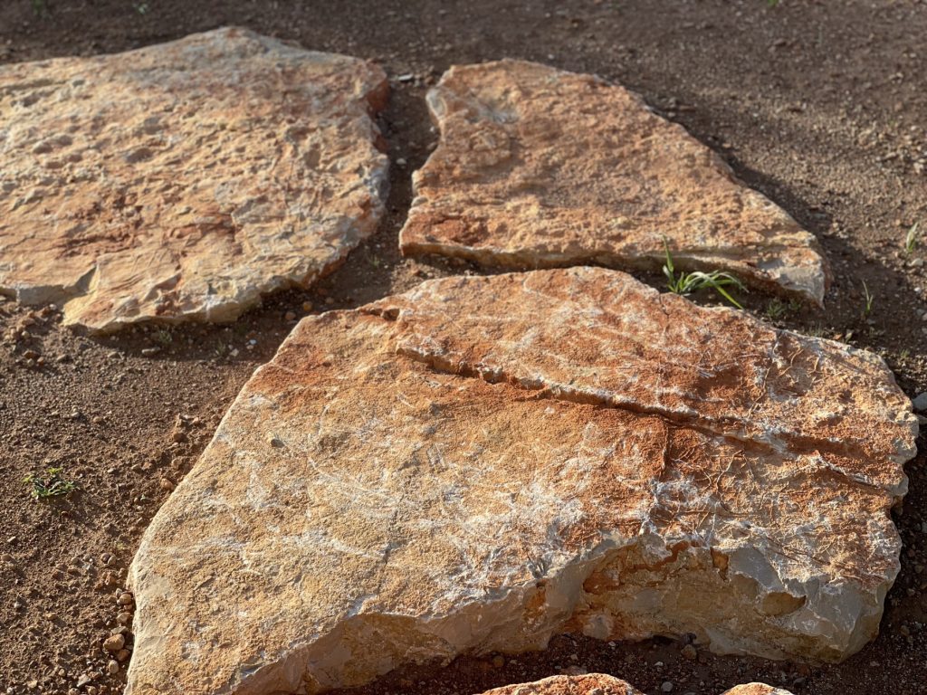 Close view of the surface and broken edges of Mallorcan natural stone slabs